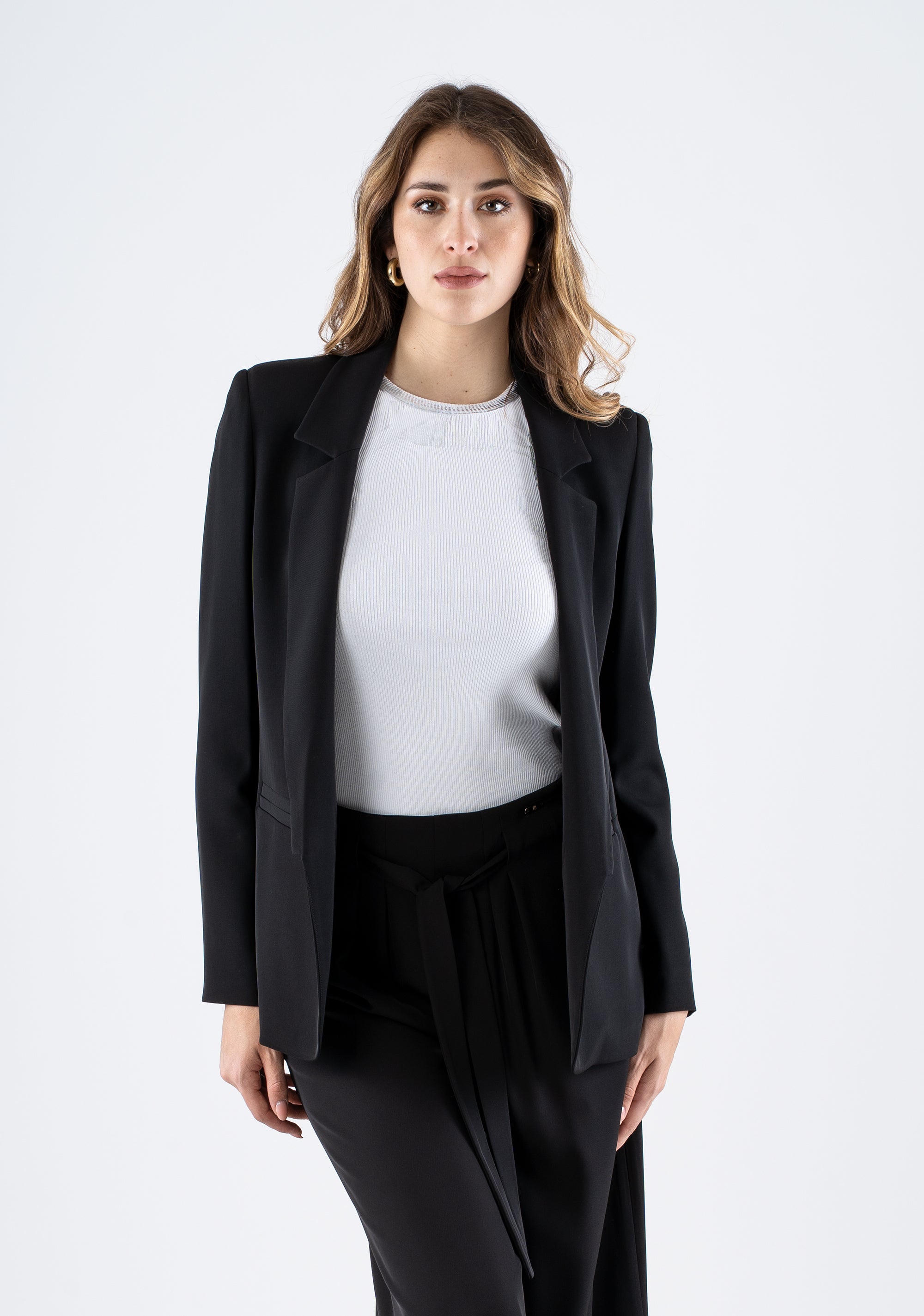 Giacca monopetto elegante con tasche a filetto