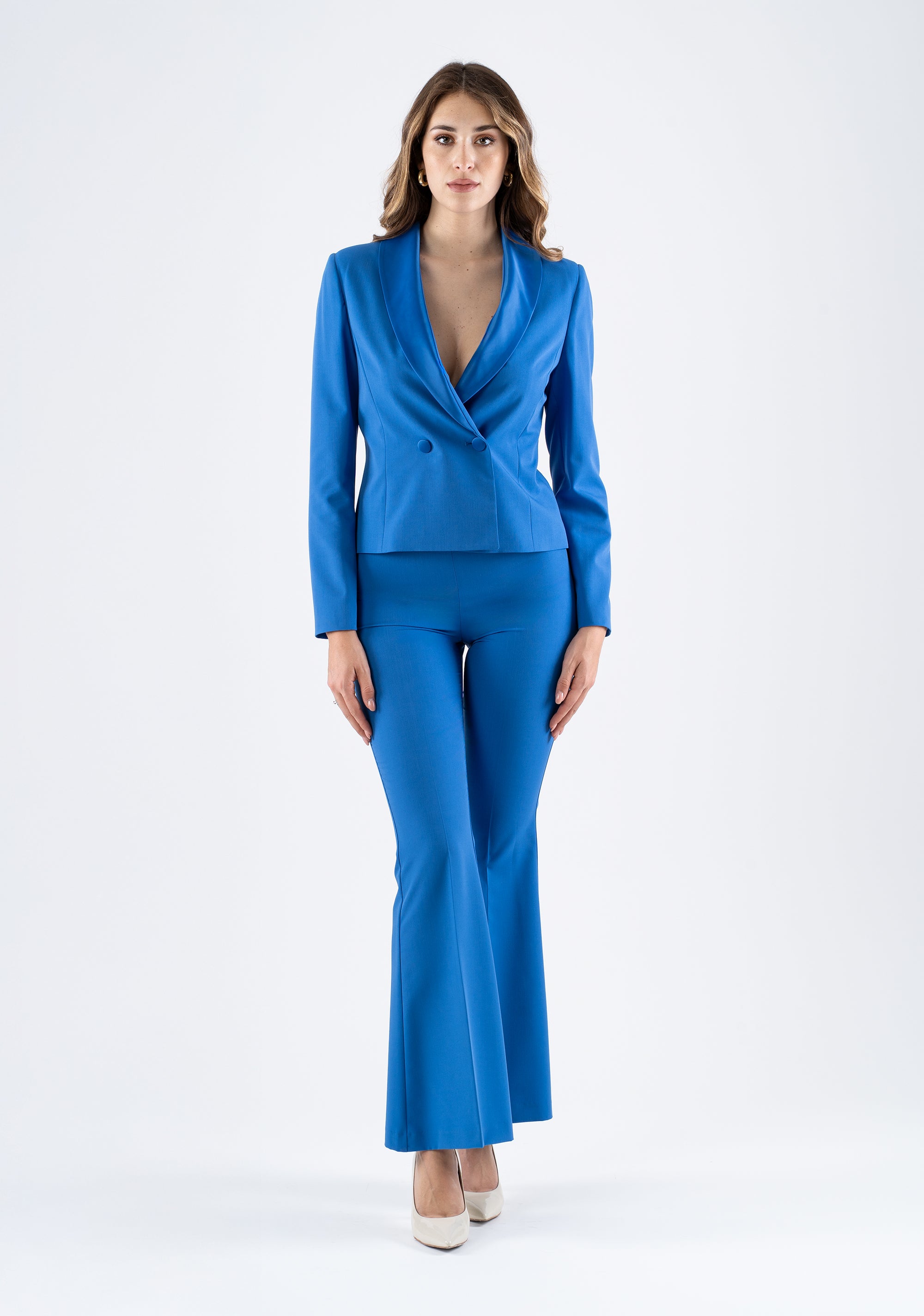 Pantalone a zampa vita alta con taglio fasciante