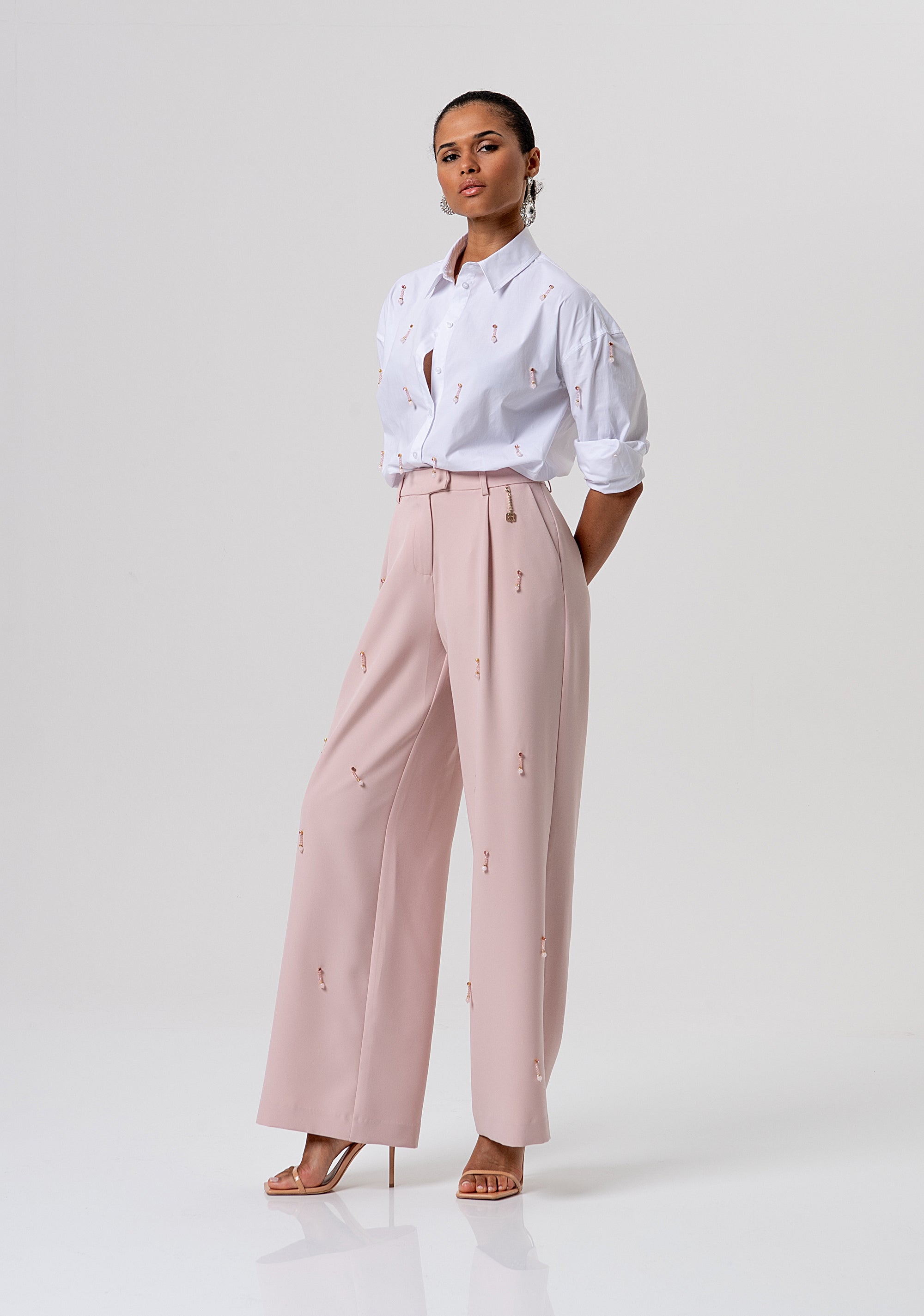 Pantalone flare a palazzo in tessuto con applicazioni gioiello