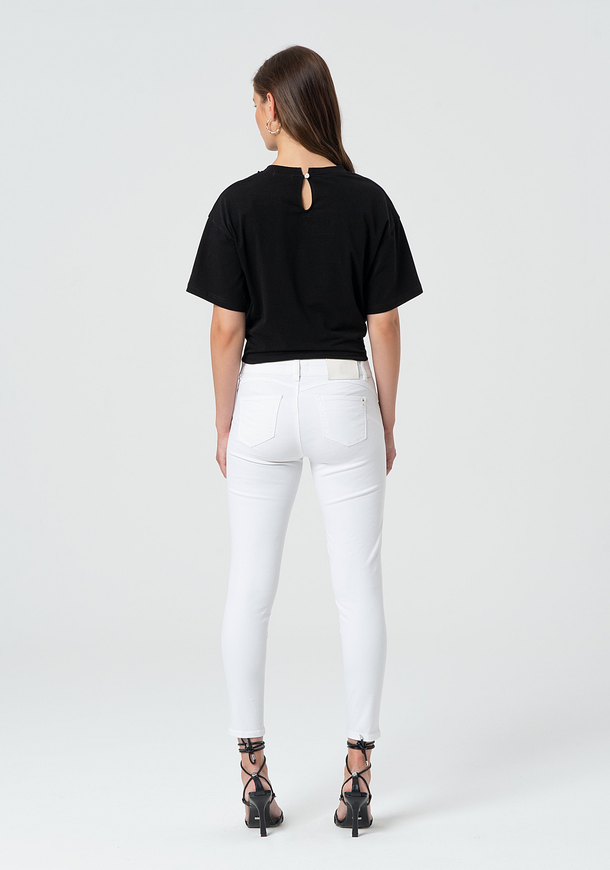 Pantaloni slim effetto push up in gabardina con applicazioni luminose