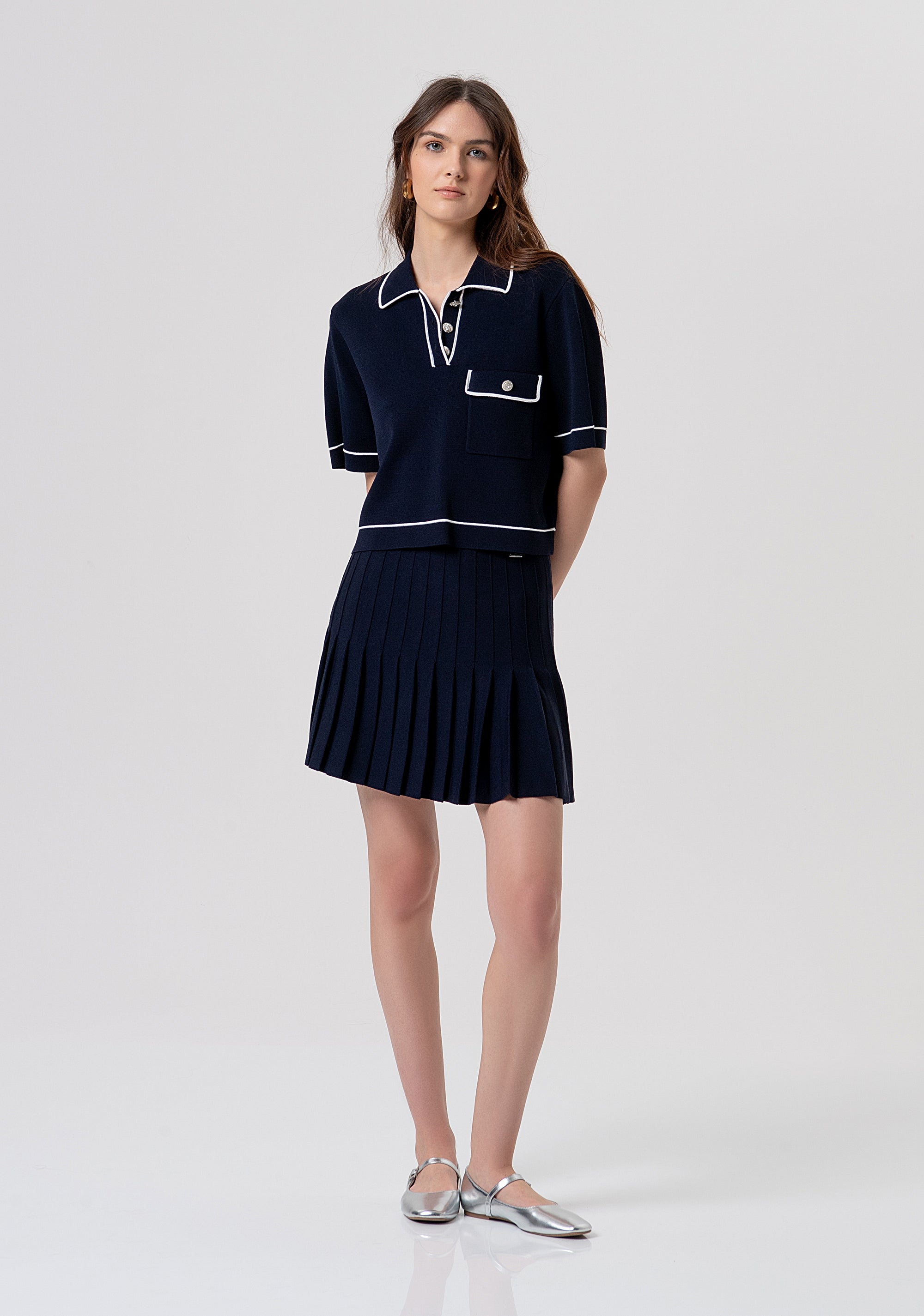 Polo cropped in maglia