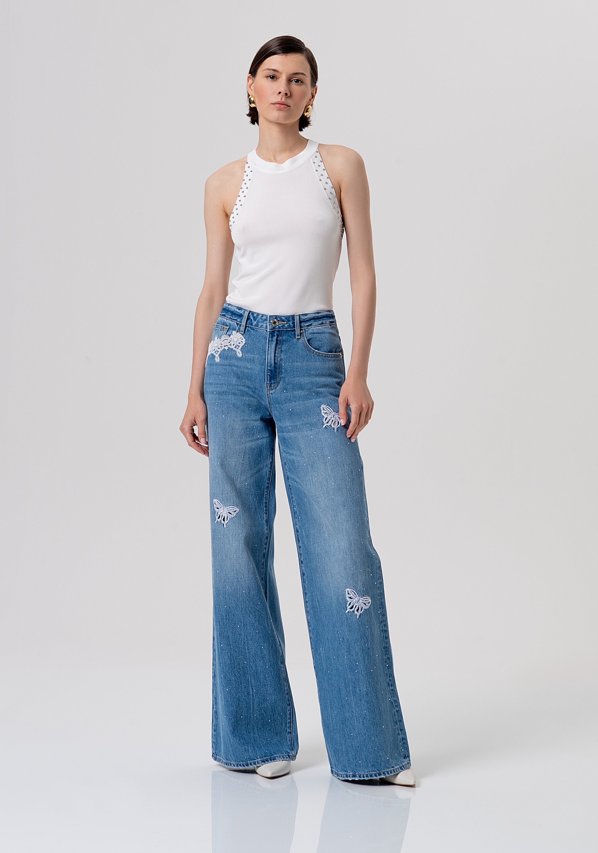 Jeans flare wide leg in denim con lavaggio medio, patch ricamati e strass FR26SV3015D41903-258 Fracomina