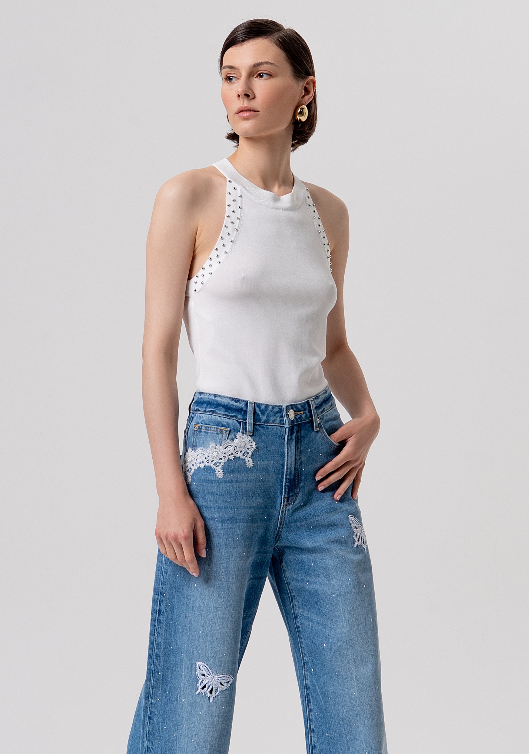 Jeans flare wide leg in denim con lavaggio medio, patch ricamati e strass FR26SV3015D41903-258 Fracomina