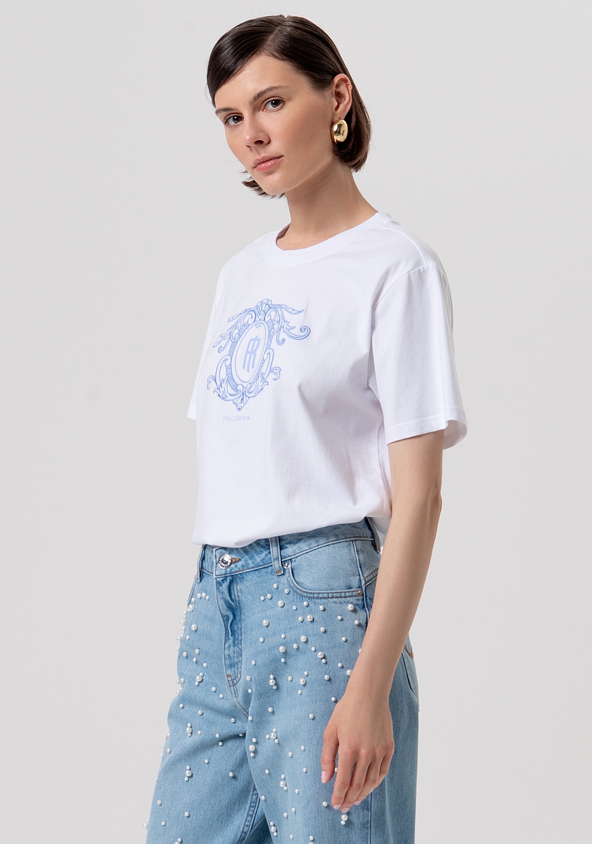 Jeans flare effetto push up in denim con lavaggio chiaro FR26SV8050D47103-062 Fracomina