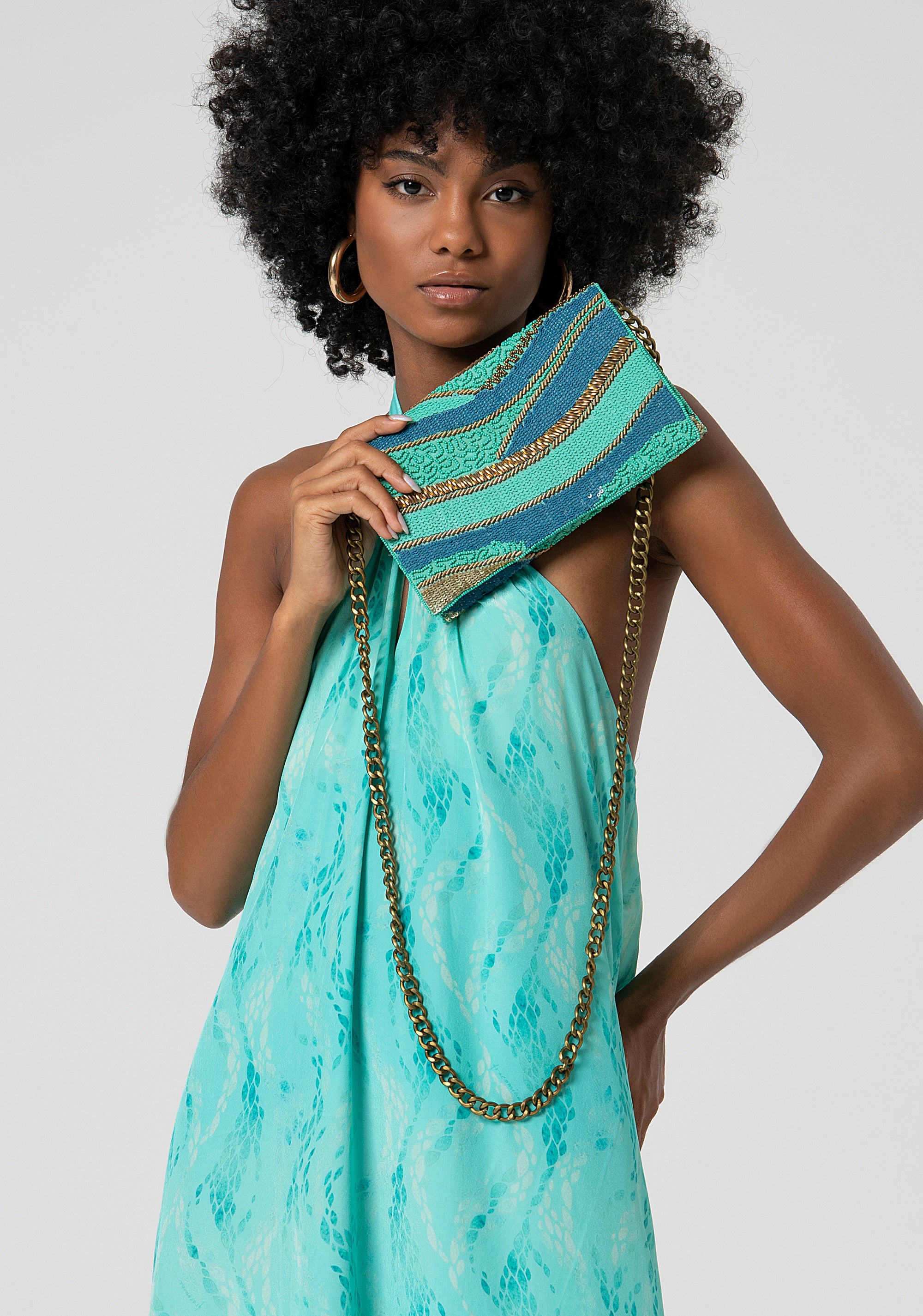 Borsa clutch con paillettes