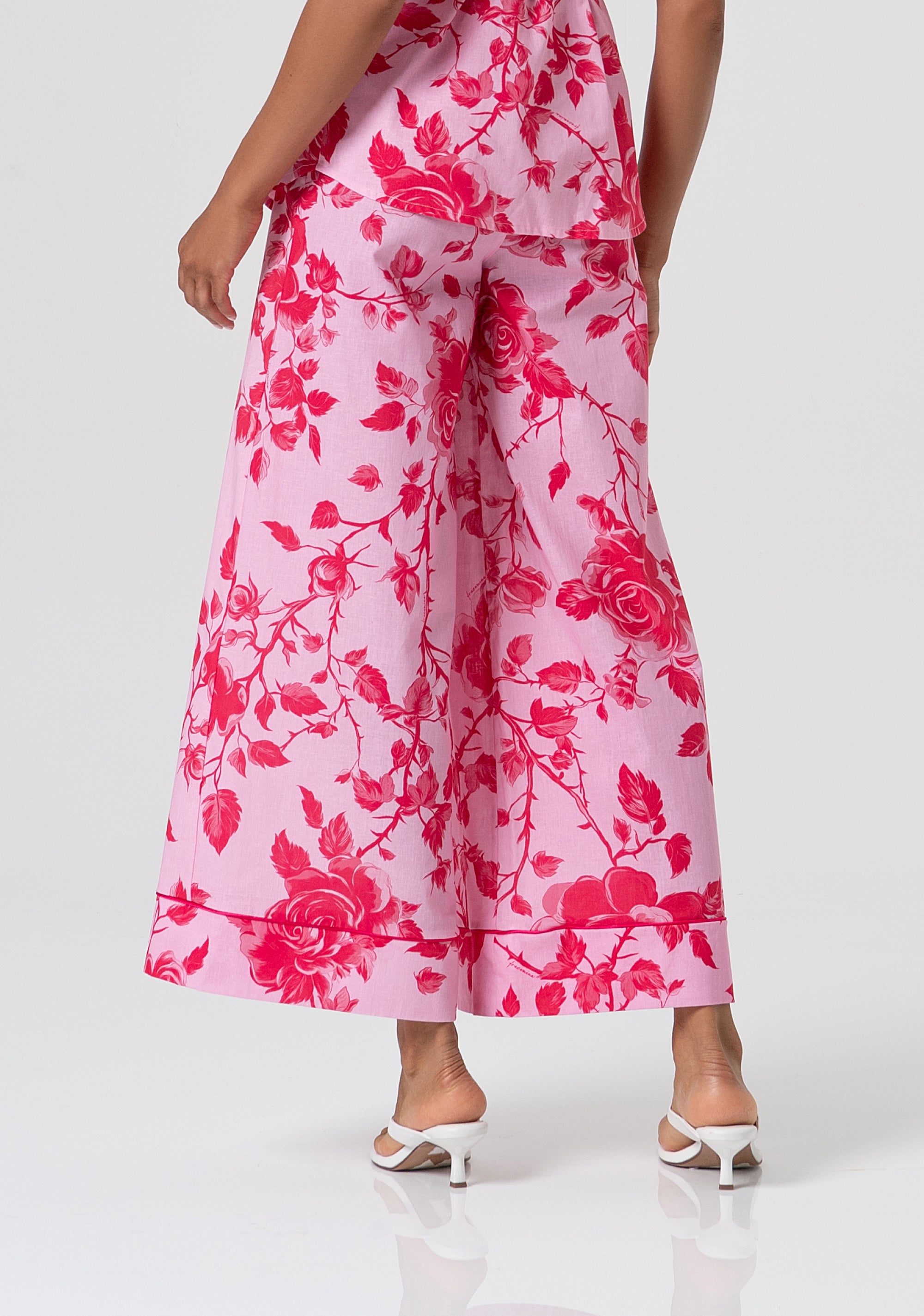 Pantaloni Wide-Leg in Stampa Rose con Profili a Contrasto
