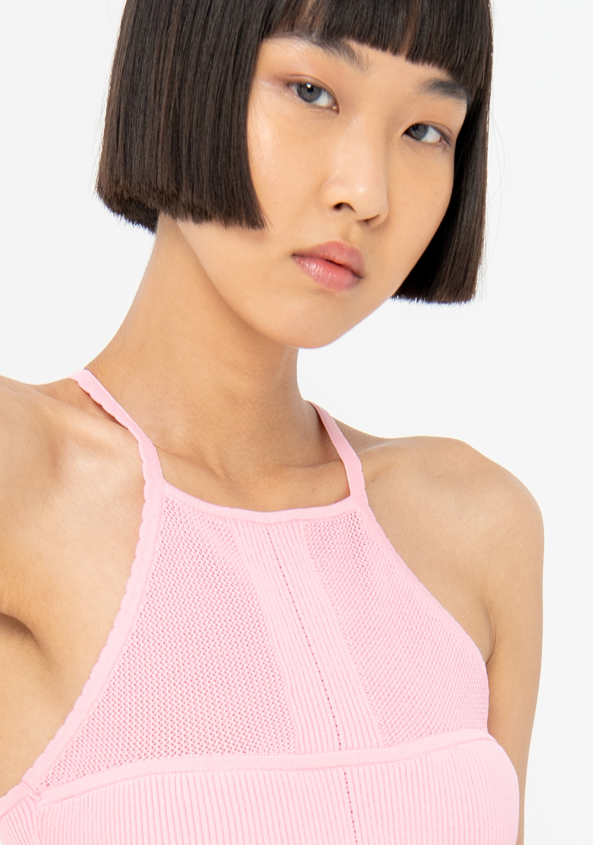 Top cropped in maglieria a costine