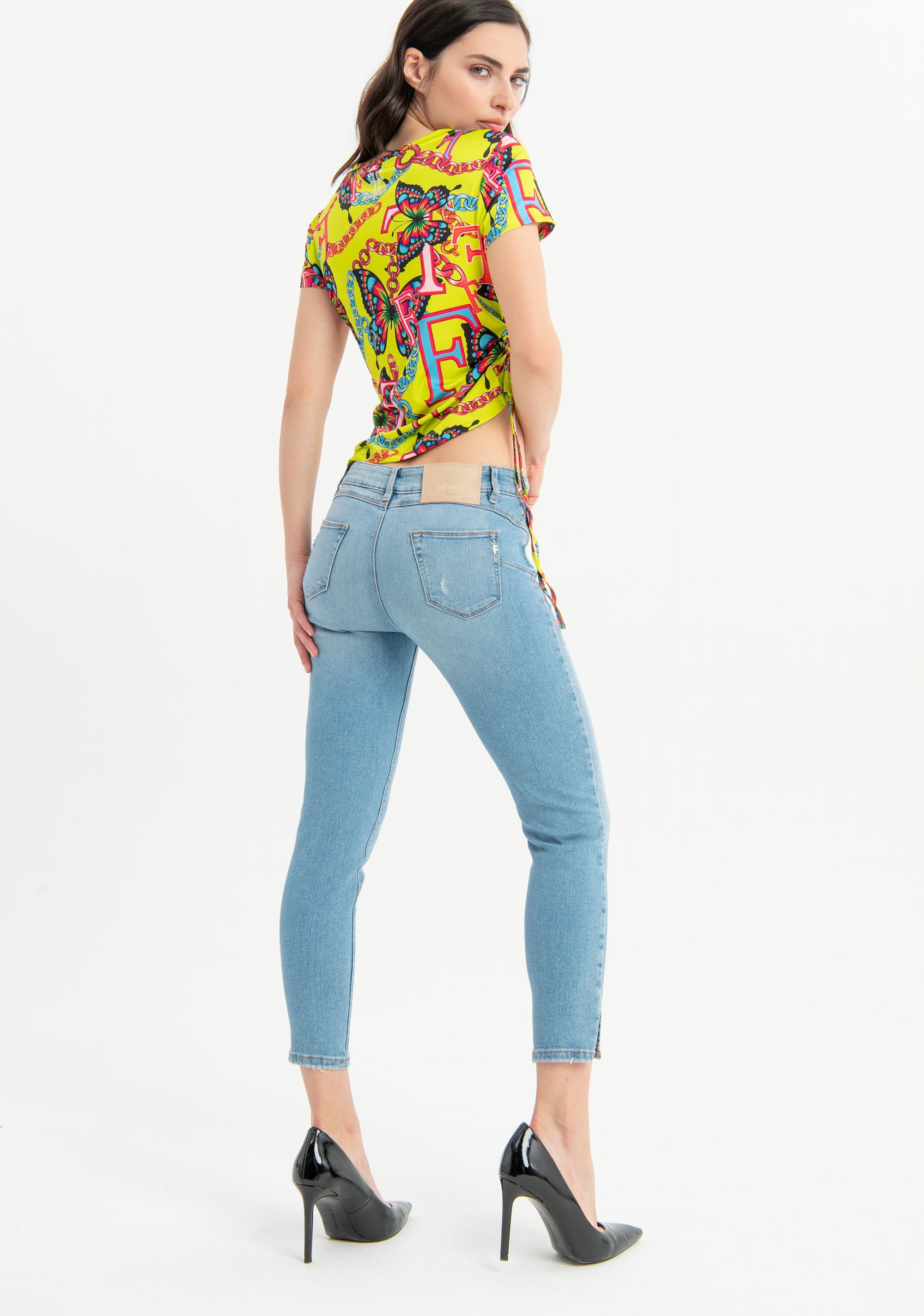 Jeans slim in denim con lavaggio chiaro