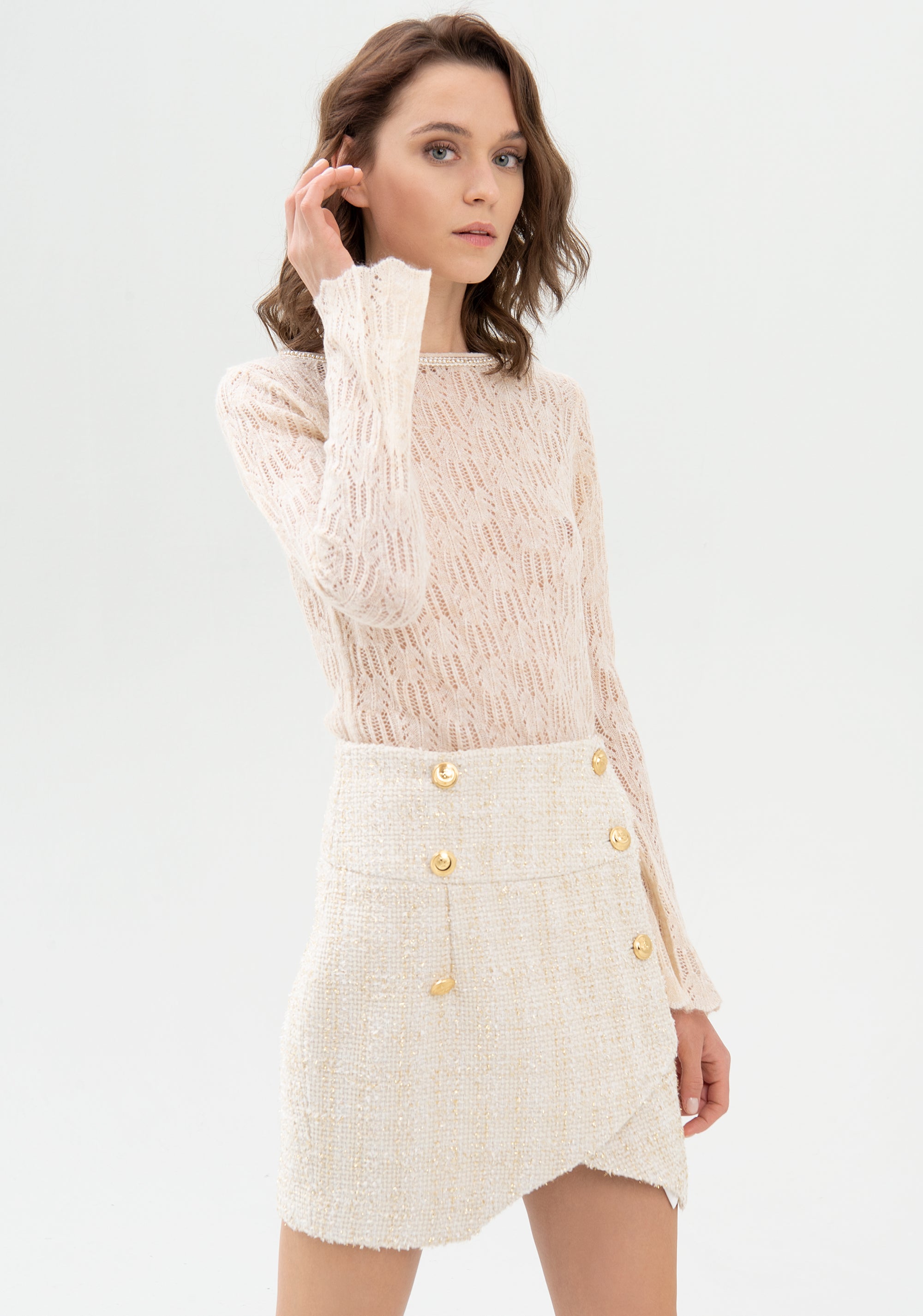 Gonna aderente mini in tweed