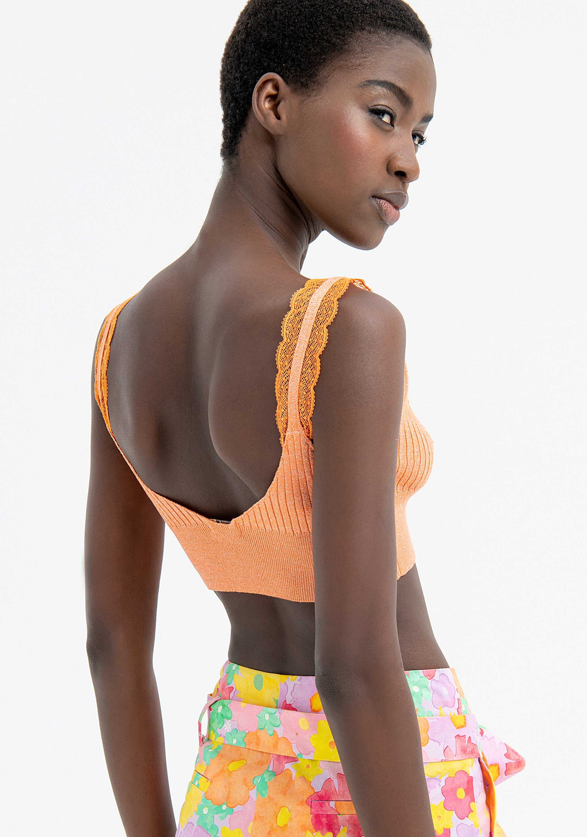 Top slim modello bralette in maglia