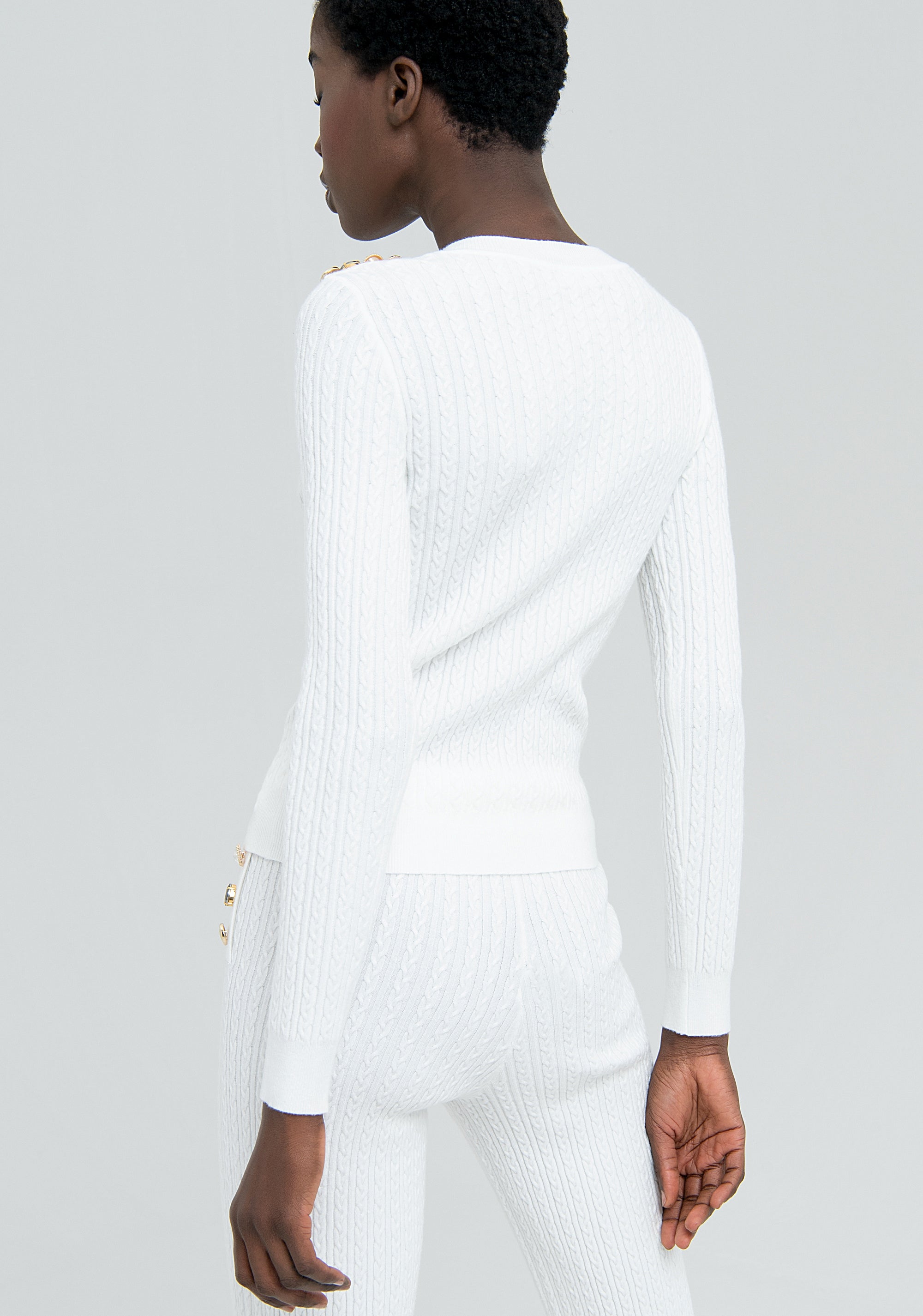 Maglia slim con trecce