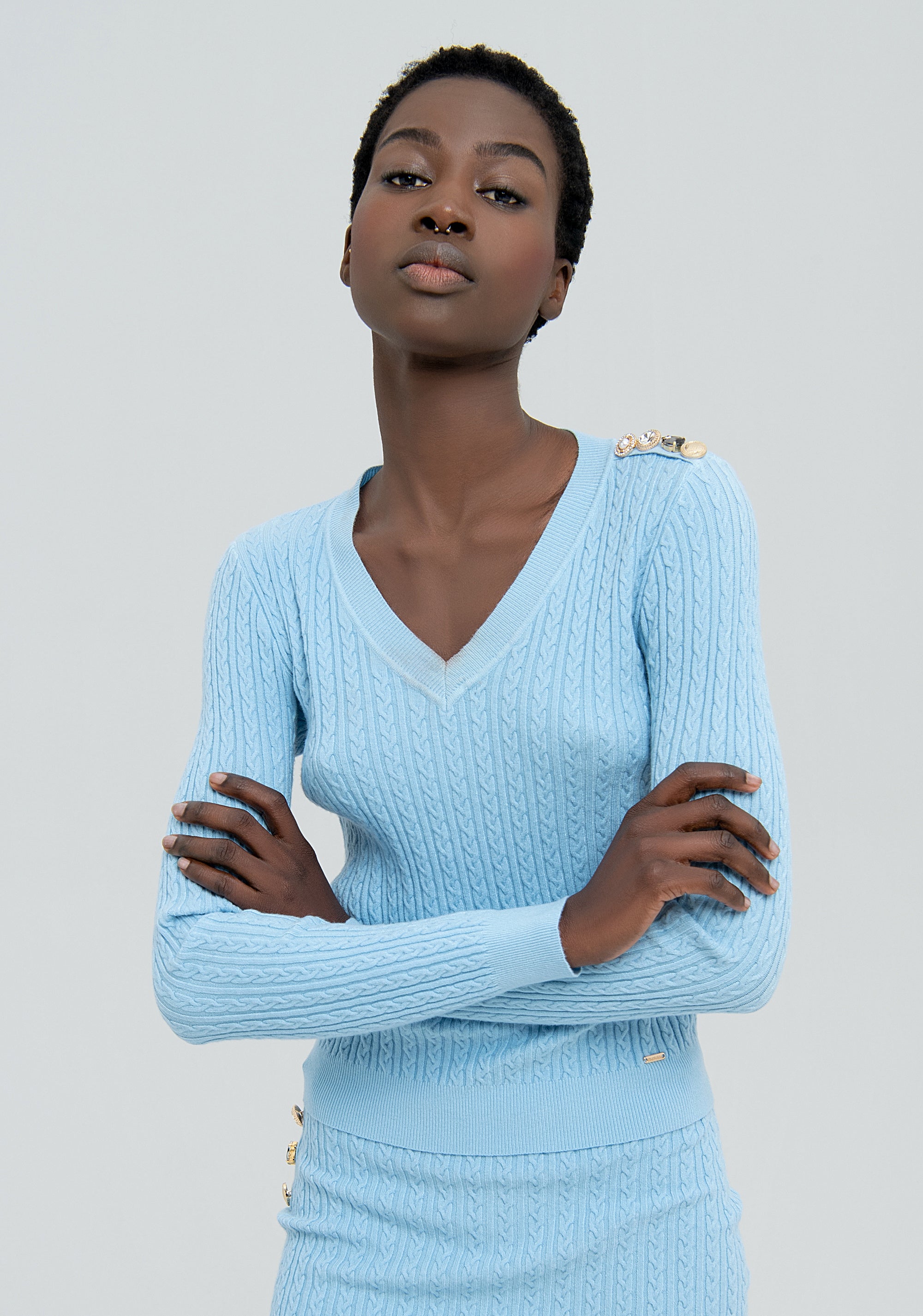 Maglia slim con trecce