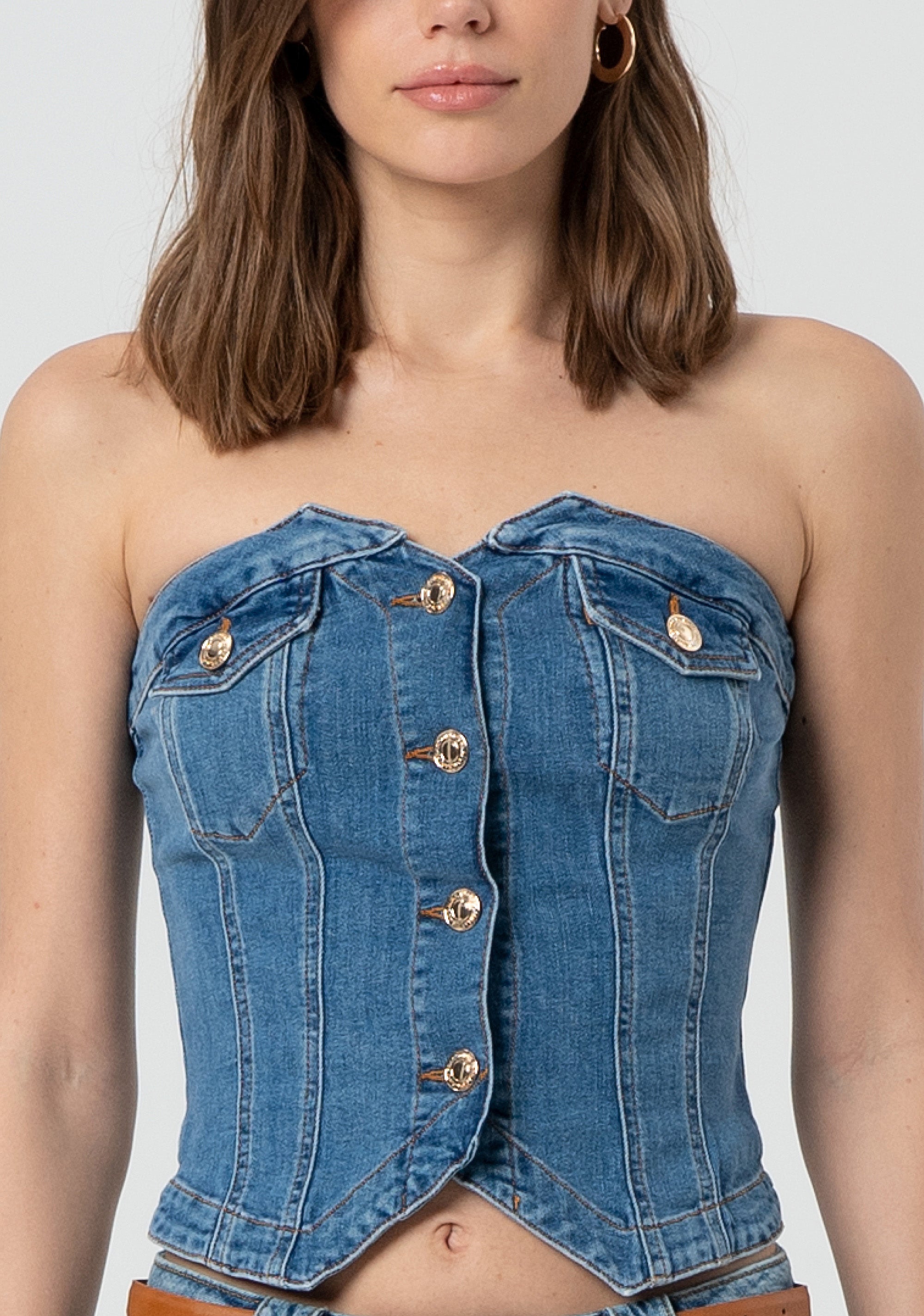 Bustier slim in denim con lavaggio medio