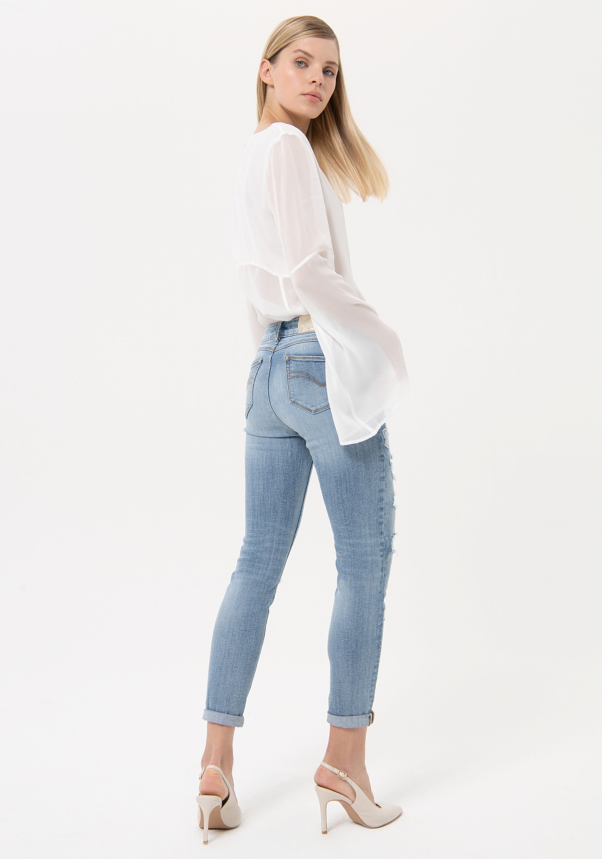 Jeans skinny effetto push up in denim con lavaggio bleached