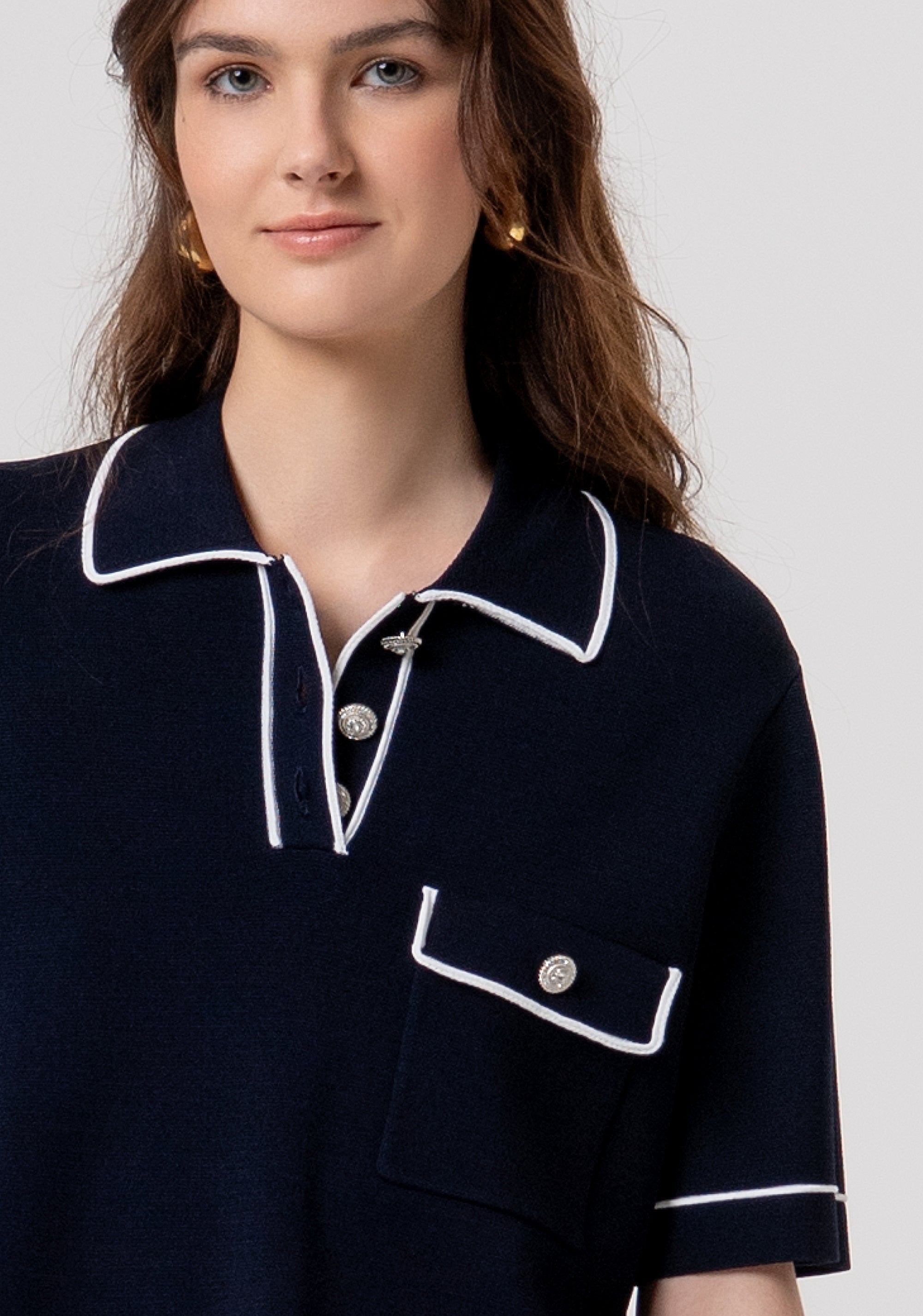 Polo cropped in maglia