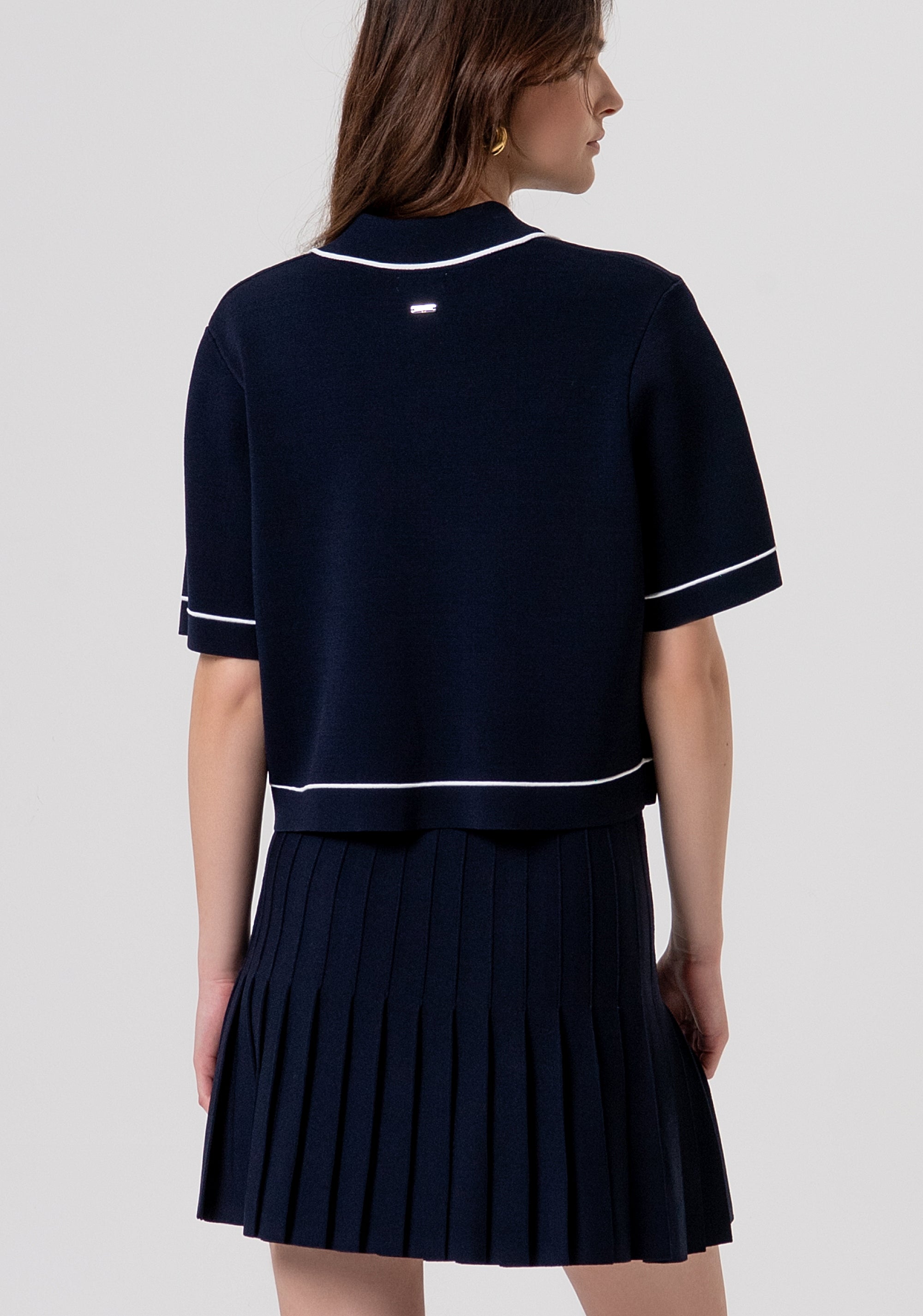 Polo cropped in maglia