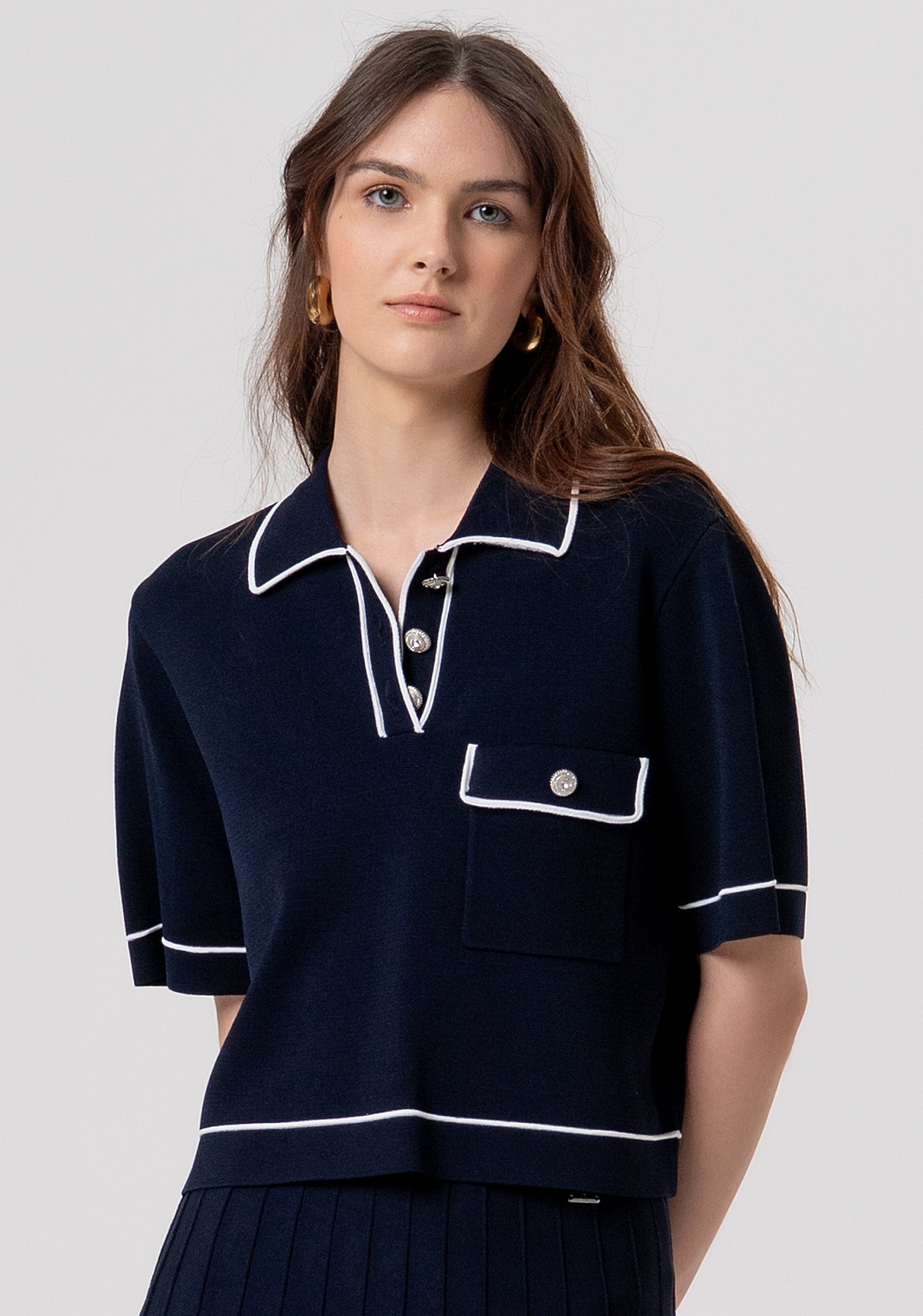 Polo cropped in maglia