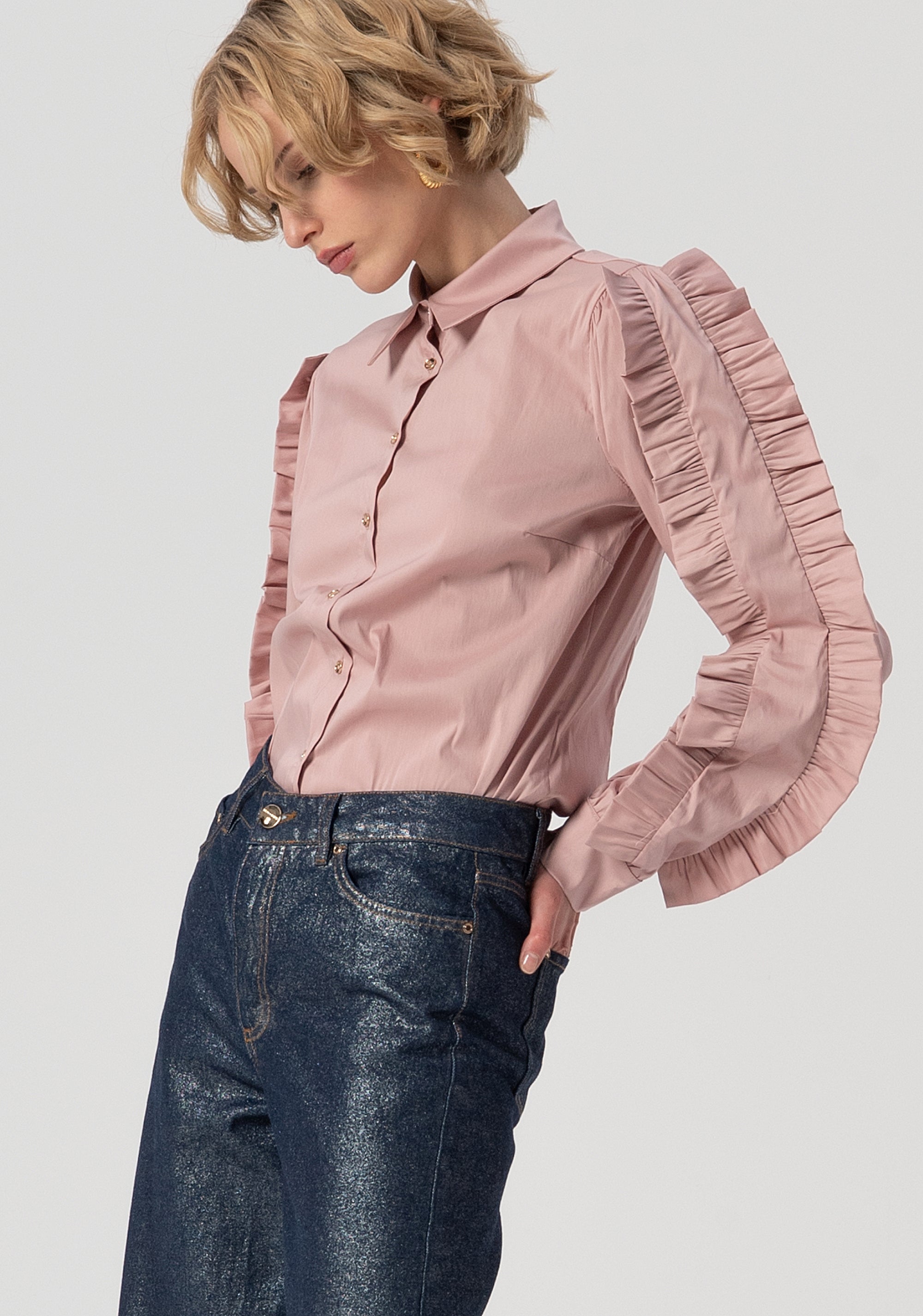 Jeans flare a palazzo in denim con spalmatura