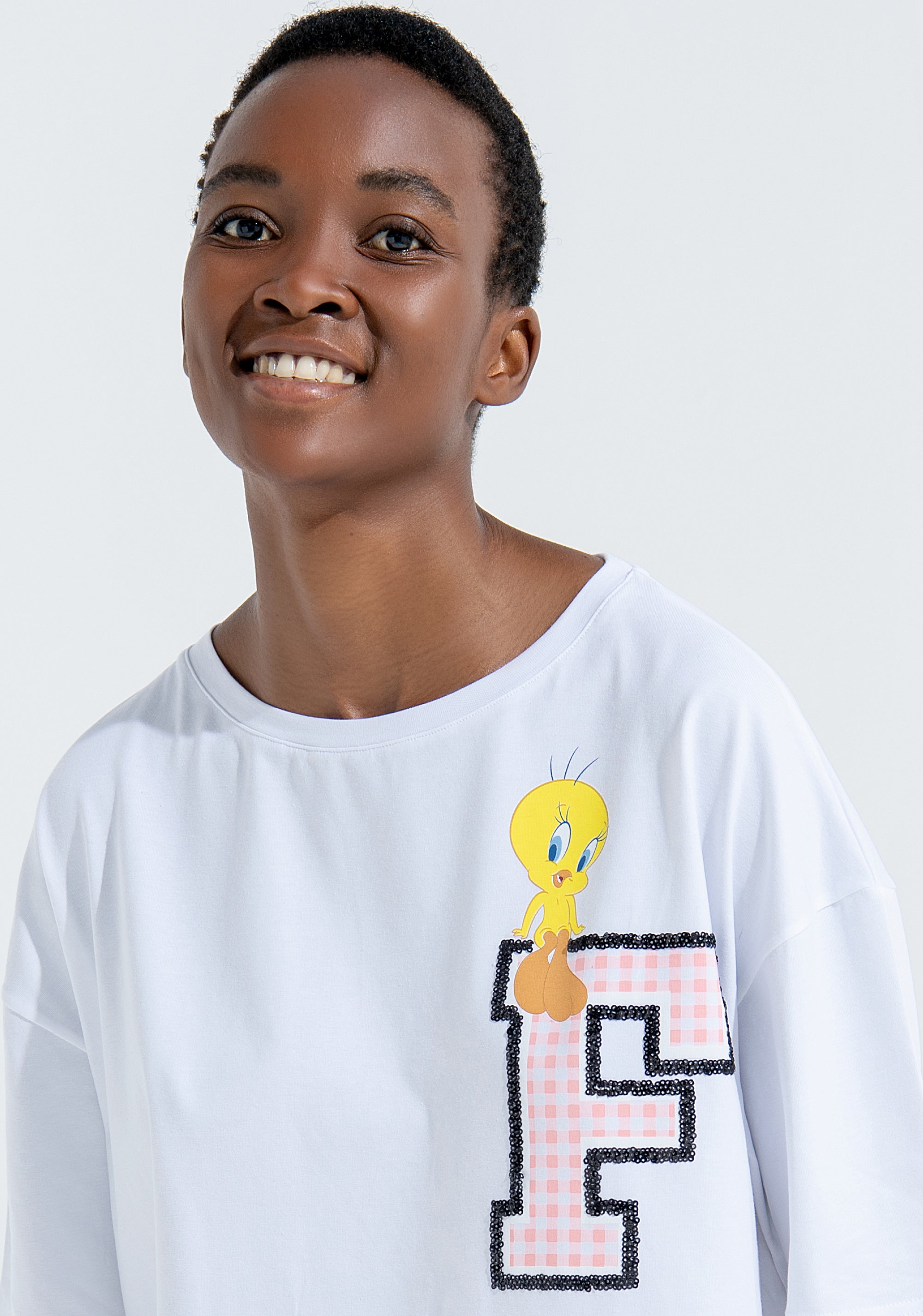 T-shirt over cropped con stampa Looney Tunes