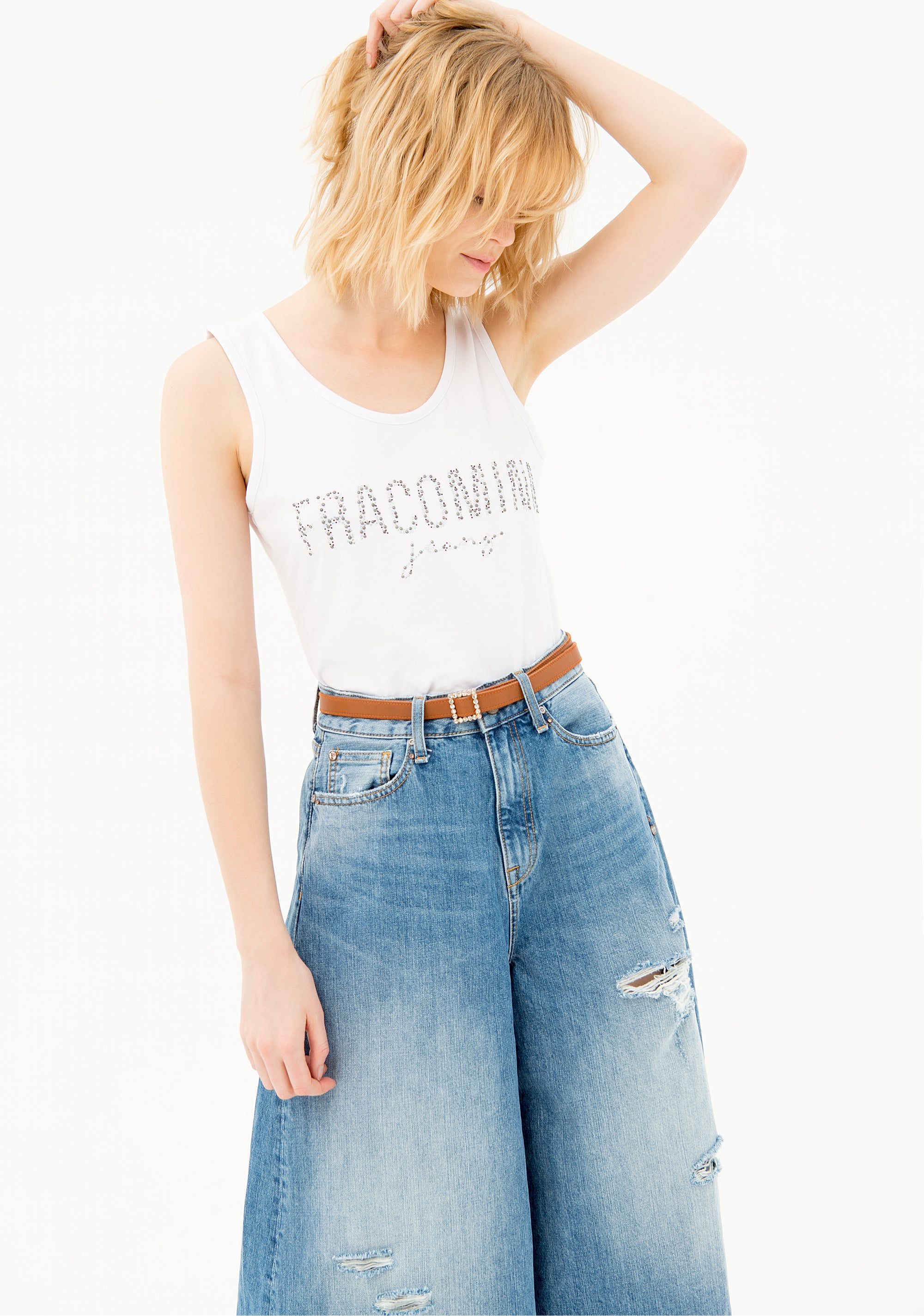 Jeans culotte flare in denim con lavaggio medio con strappi