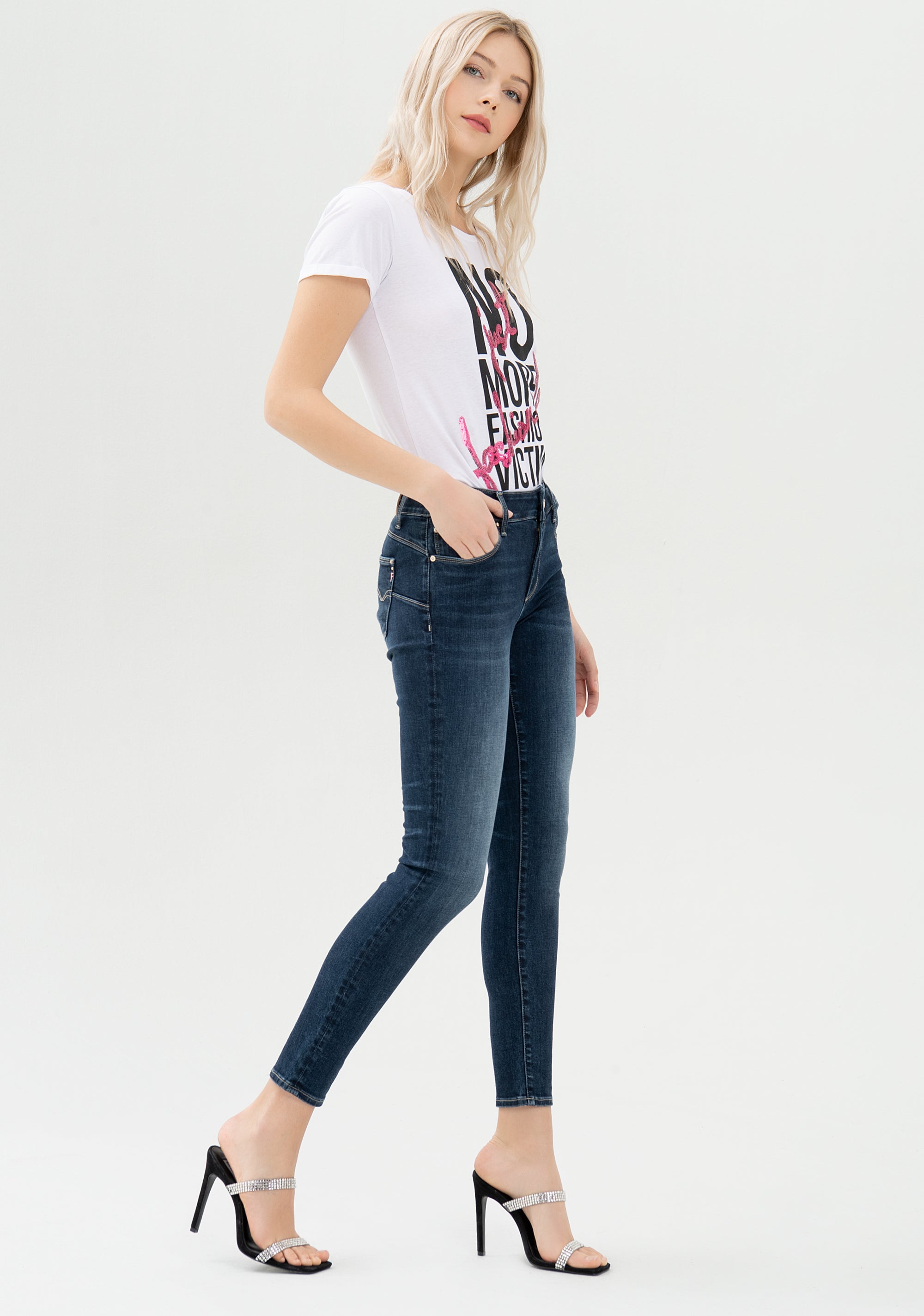 Jeans skinny in denim nero con lavaggio scuro