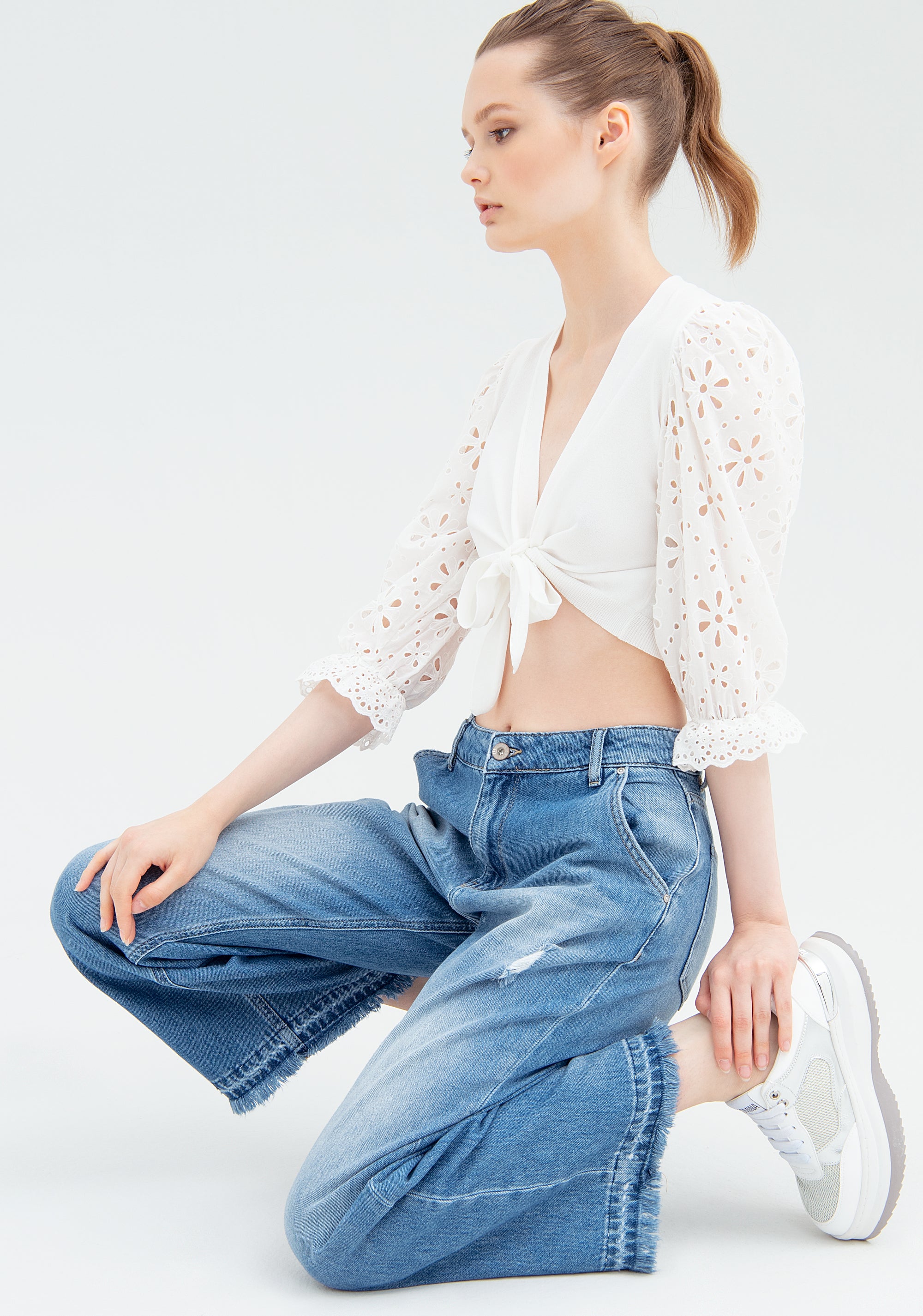 Jeans culotte cropped in denim con lavaggio medio