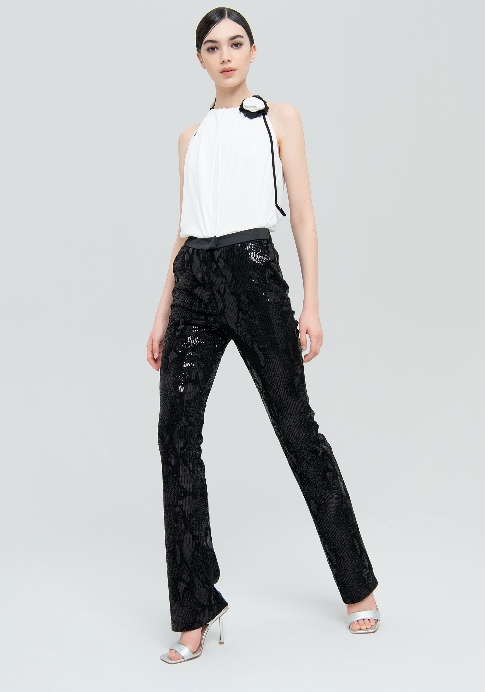 Pantalone bootcut in fantasia geometrica