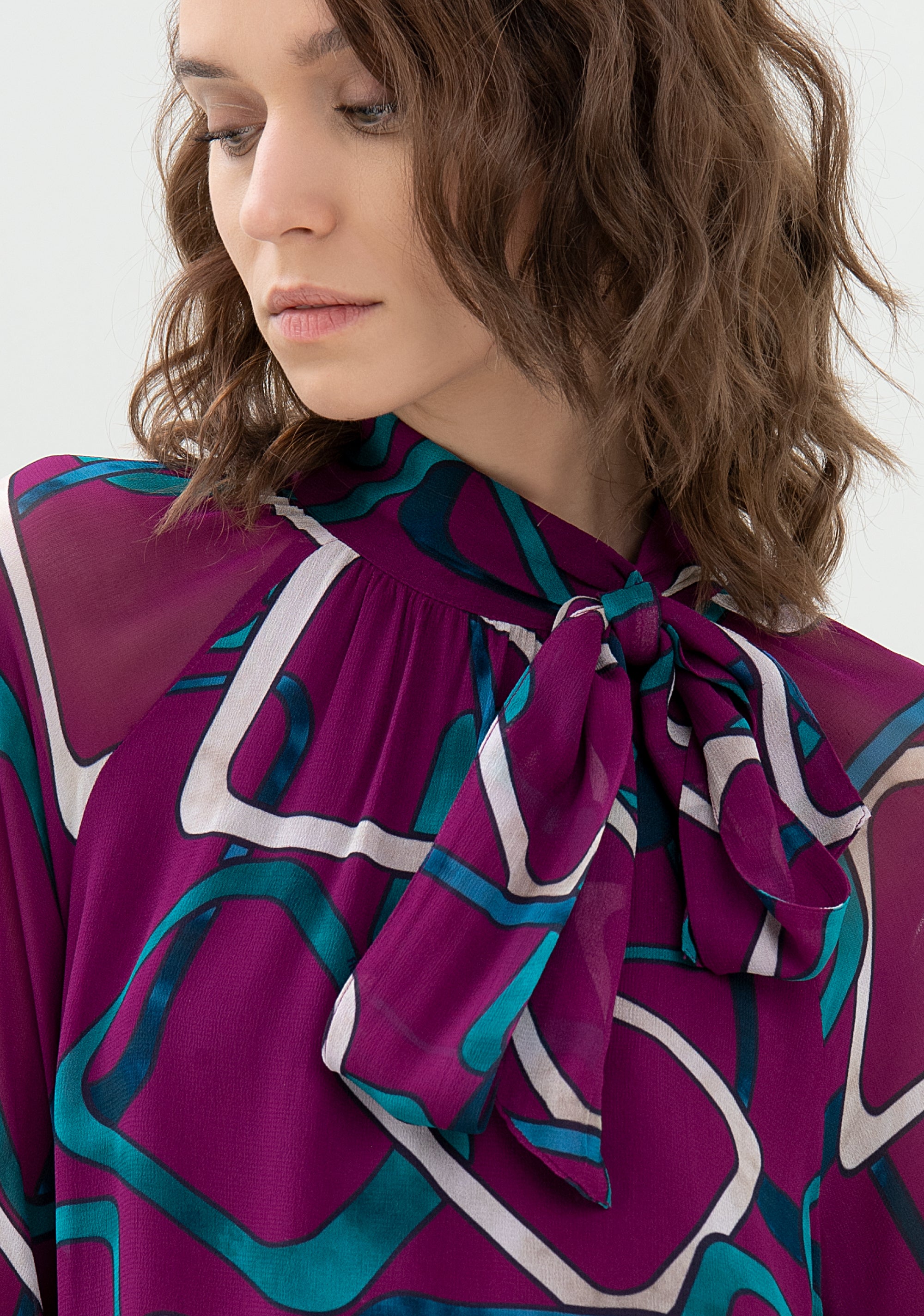 Blusa ampia con fantasia geometrica