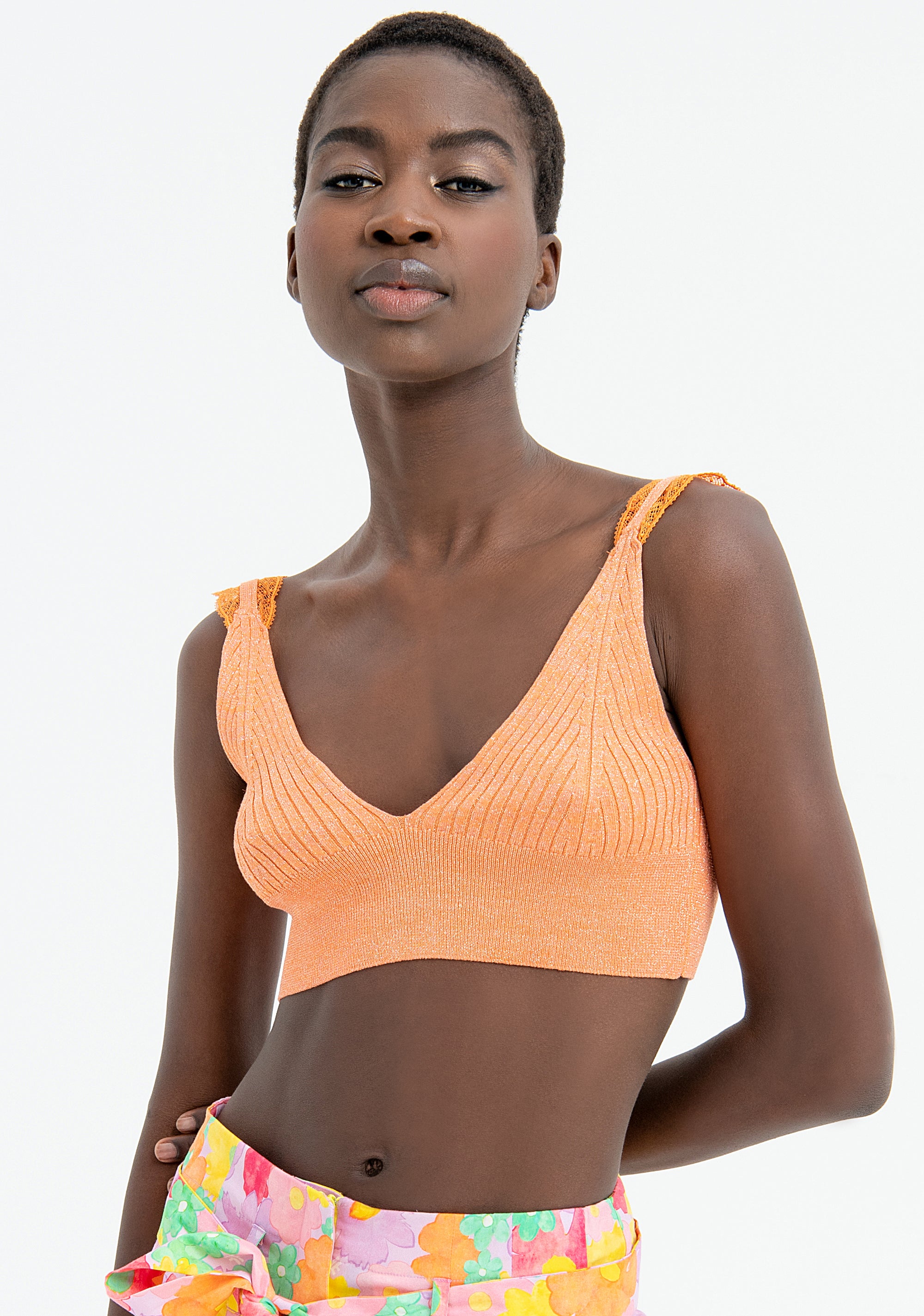 Top slim modello bralette in maglia