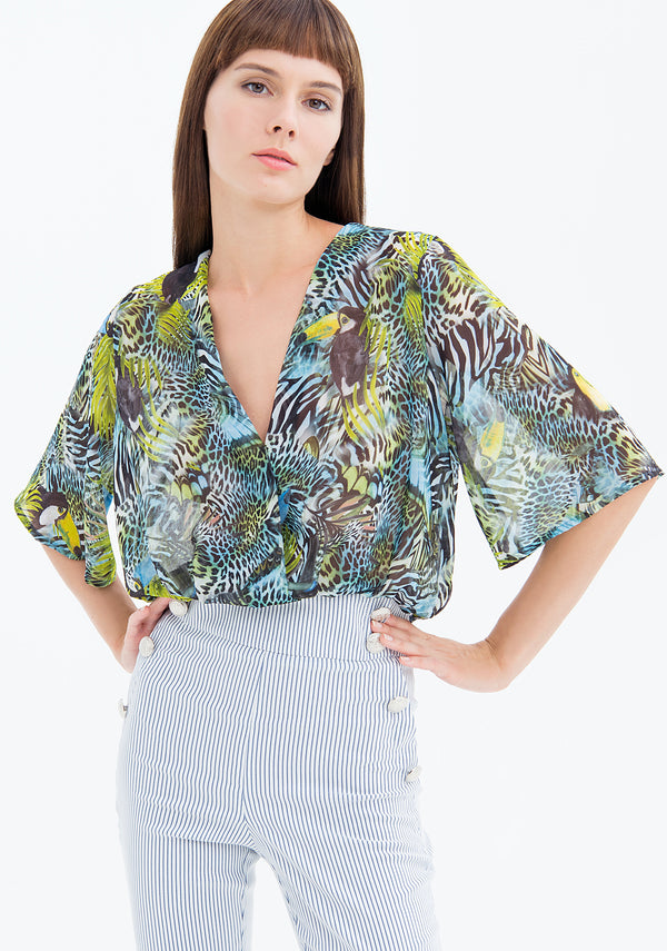 Blusa over cropped in fantasia animalier